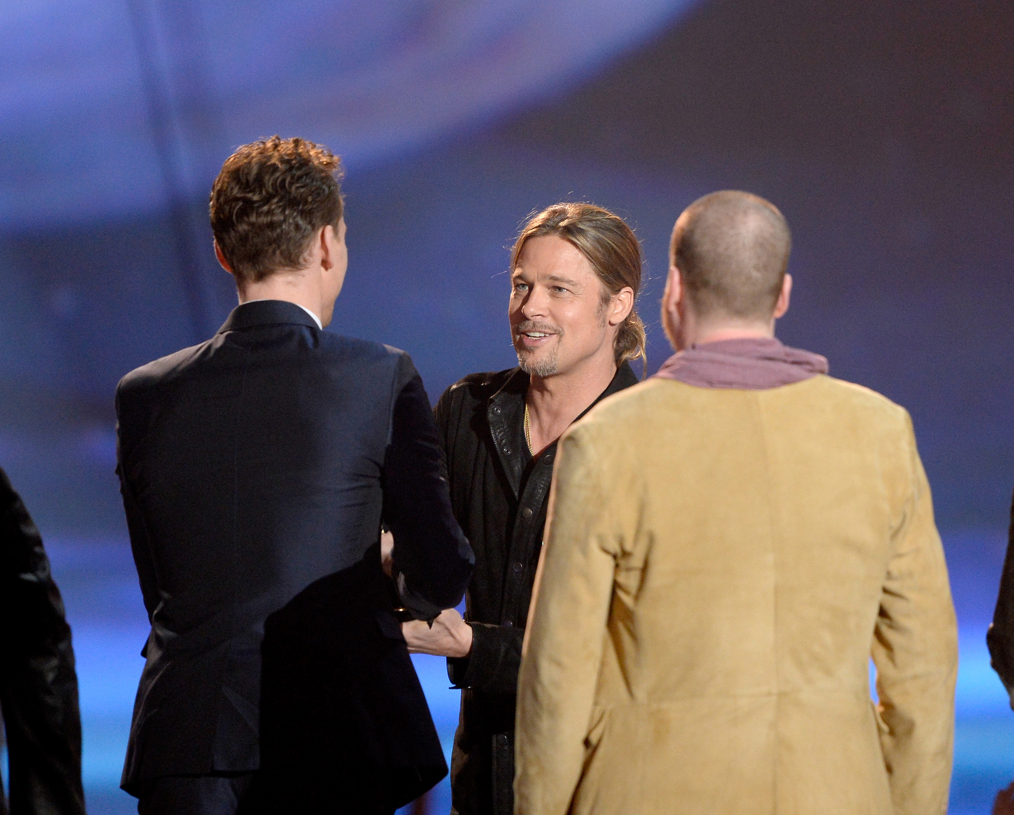 Brad Pitt, Joss Whedon and Tom Hiddleston at event of 2013 MTV Movie Awards (2013)