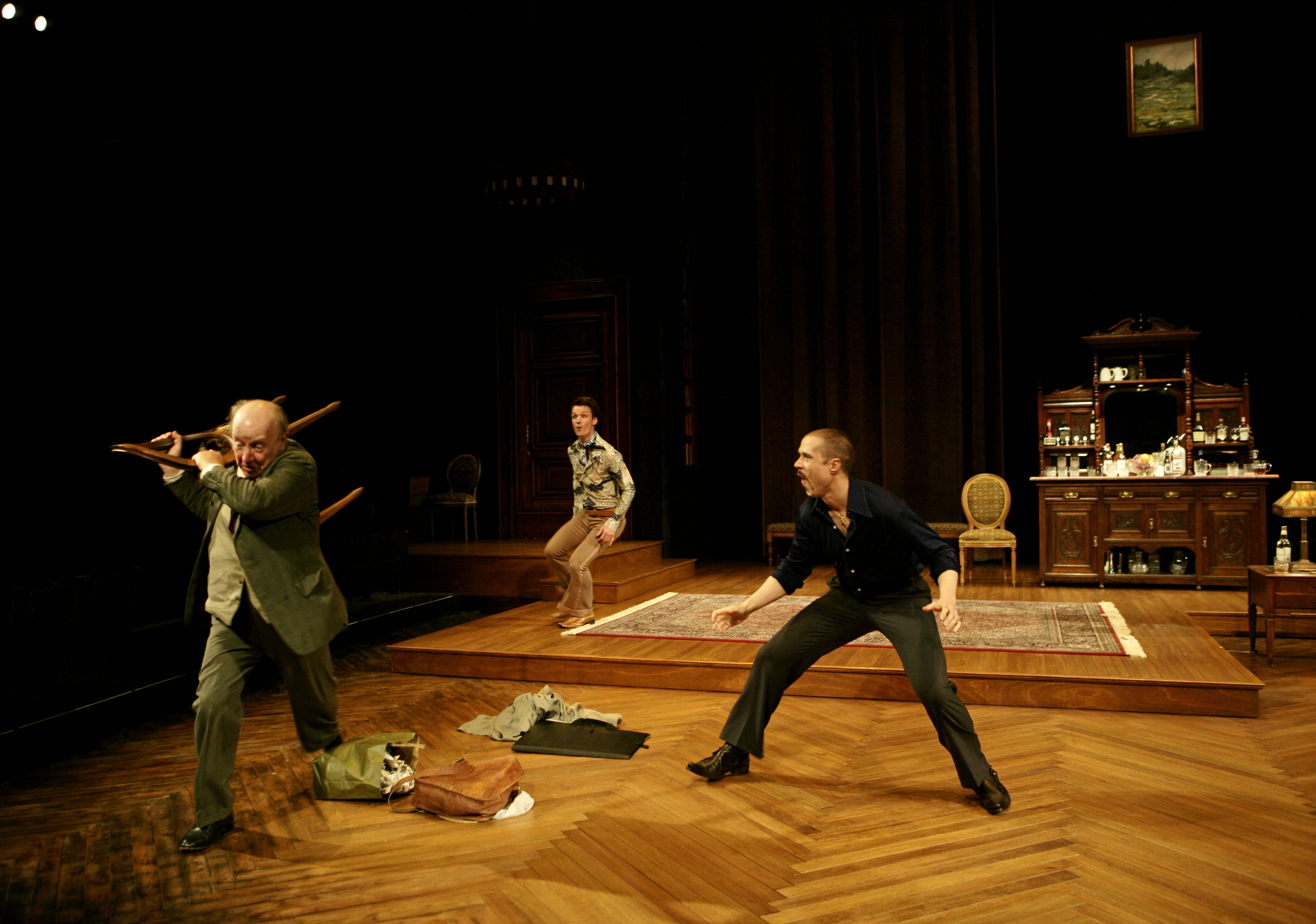 Max Wright as Spooner, Henry David Clarke as Foster, and Lewis D. Wheeler as Briggs in Harold Pinter's NO MAN'S LAND at the American Repertory Theater.