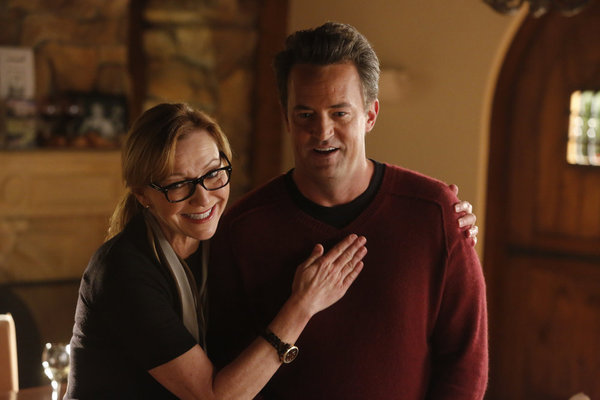 Still of Matthew Perry and Julie White in Go On: The World Ain't Over 'Til It's Over (2012)