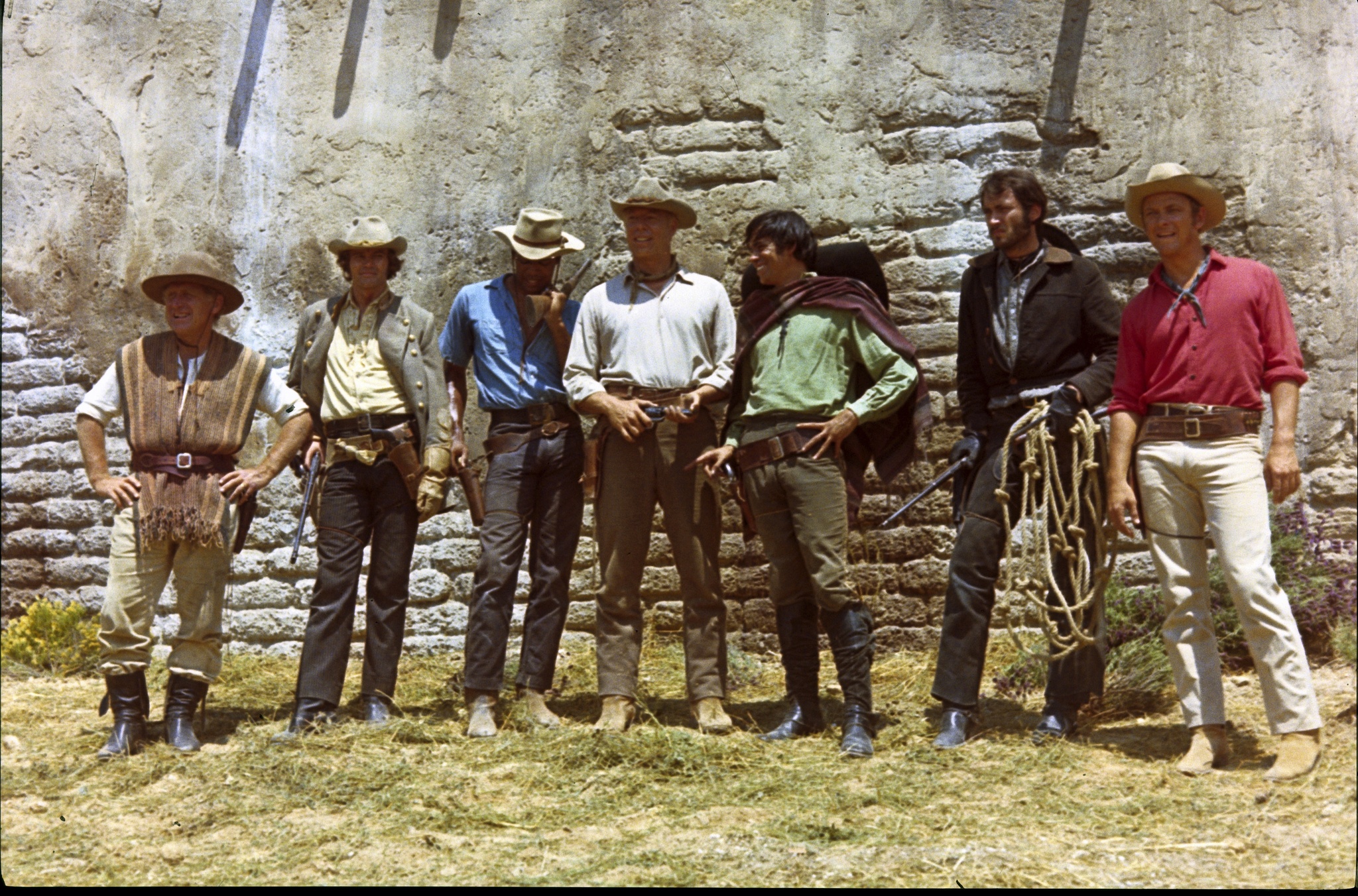 Still of George Kennedy, Monte Markham, Reni Santoni and James Whitmore in Guns of the Magnificent Seven (1969)