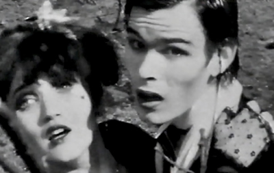 Barbie Wilde with Sean Crawford (Tok from Tik and Tok) in the video to Ultravox's 1981 single, Passing Strangers.