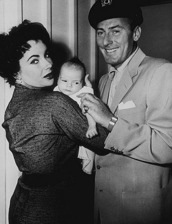 Elizabeth Taylor and Michael Wilding with their first child, Michael Howard Jr.