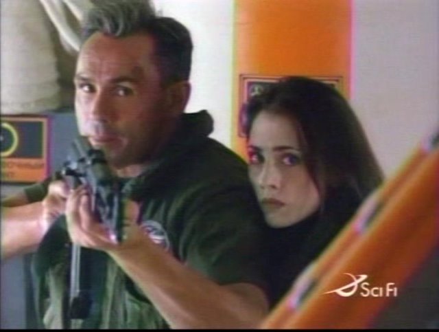 Olivier Gruner and Adrienne Wilkinson in a scene from Alpha Force