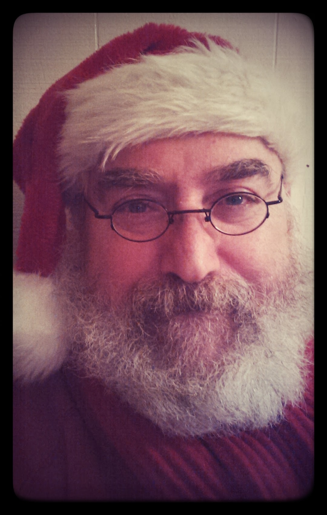 Me as Santa, and yes, that's my real beard and working glasses. I love working with kids!