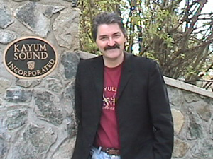 Ken at the front gate of Kayum Sound Inc.