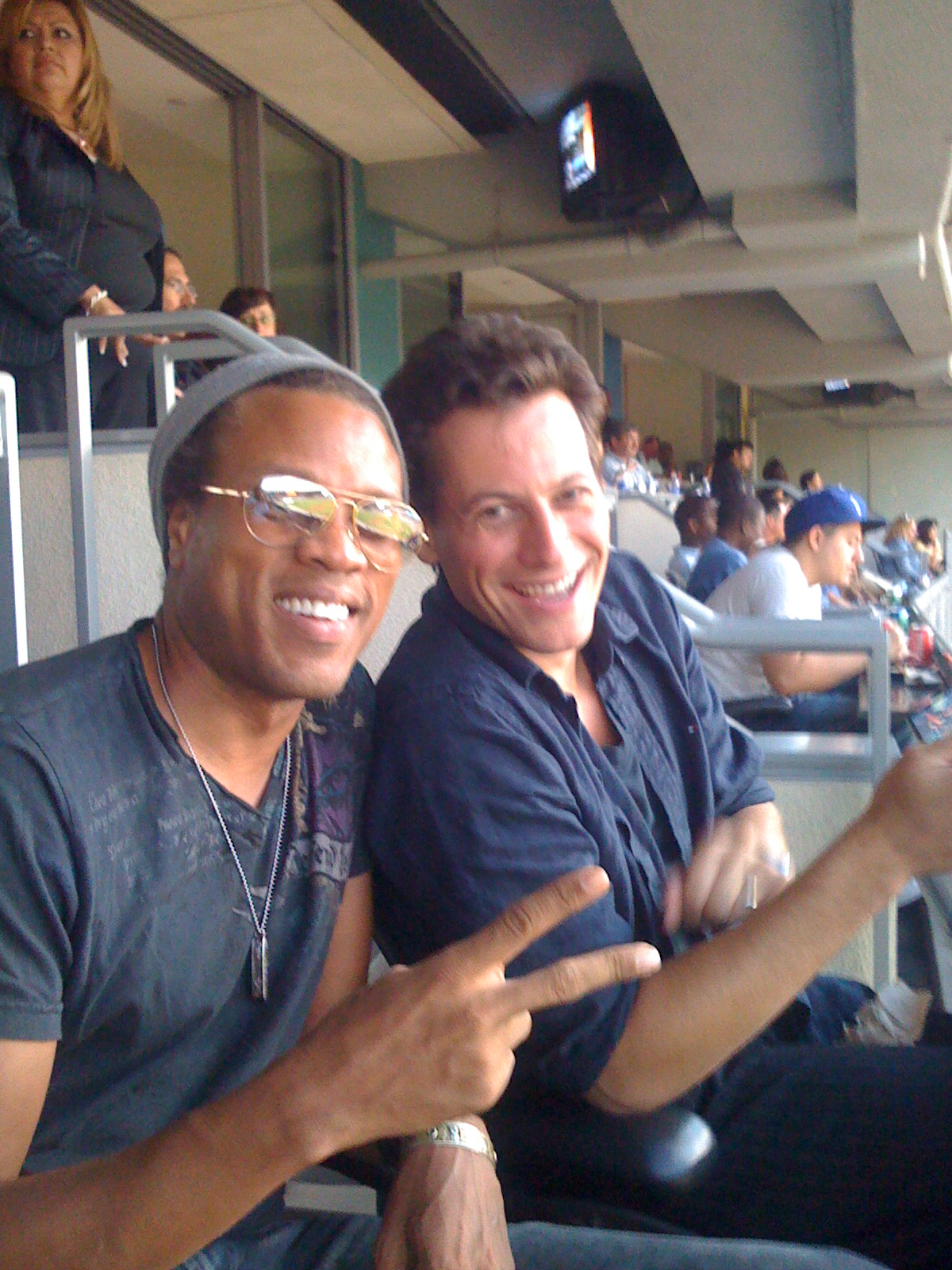 Raymond T. Williams and Ioan Gruffudd at a Dodger game Los Angeles