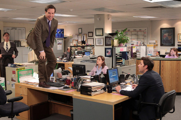 Still of Rainn Wilson, John Krasinski and Ellie Kemper in The Office (2005)