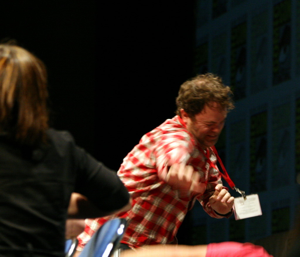 Rainn Wilson and Nathan Fillion in the process of answering the fan question, 