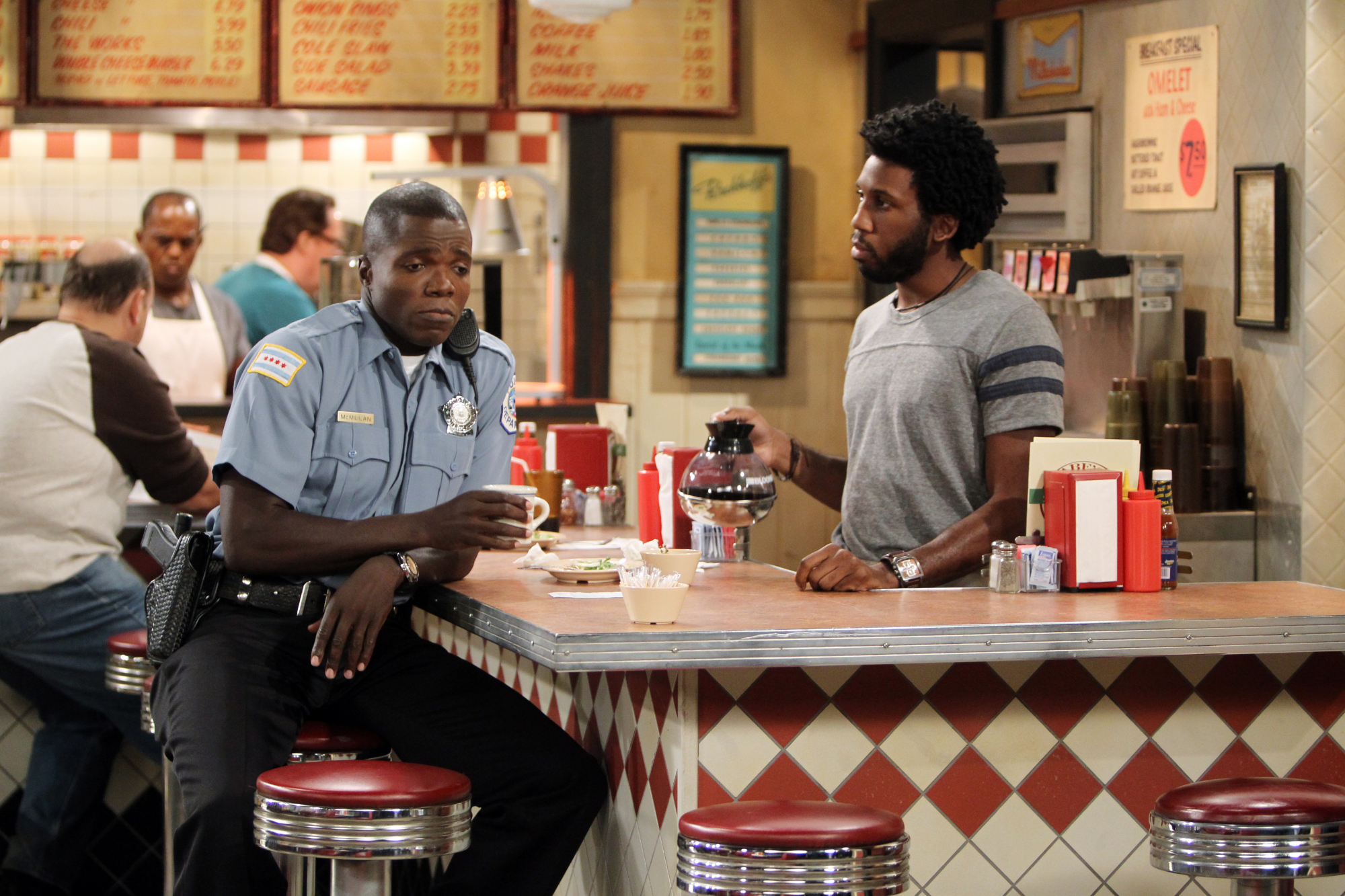 Still of Reno Wilson and Nyambi Nyambi in Mike & Molly: The Honeymoon Is Over (2012)