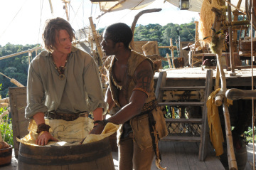 Still of Philip Winchester and Tongayi Chirisa in Crusoe (2008)