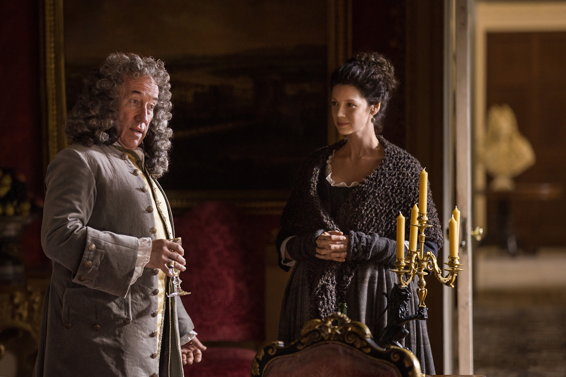 Still of Simon Callow and Caitriona Balfe in Outlander (2014)