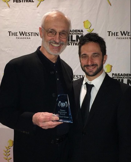 Aaron Wolf presenting Michael Gross with the Career Achievement Award