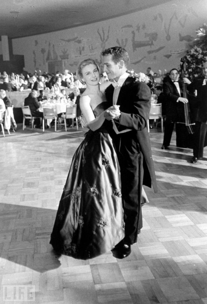 Joanne Woodward dances with husband Paul Newman following her Oscar win for best actress in 1957's 
