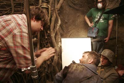 Director Boris Schaarschmidt, Braden Wright, Matt Lindquist, between takes on the set of 