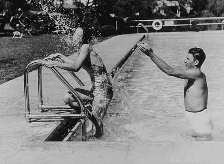 Ronald Reagan and wife Jane Wyman in their pool C. 1940