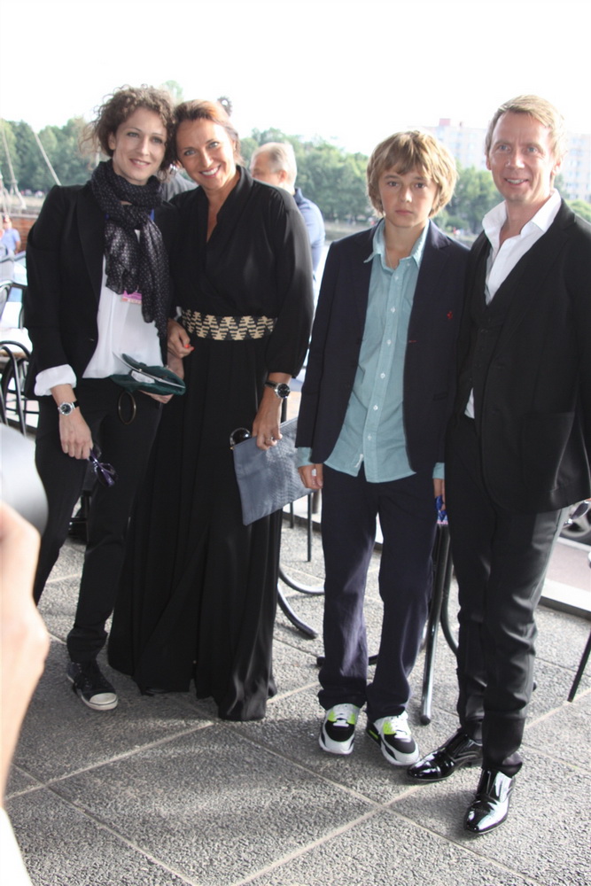 Kseniya Rappoport, Tatyana Lyutaeva with son Domenic, Vyacheslav Yakovlev (Slava N Jakovleff) during the opening ceremony of The XX Russian Filmfestival 