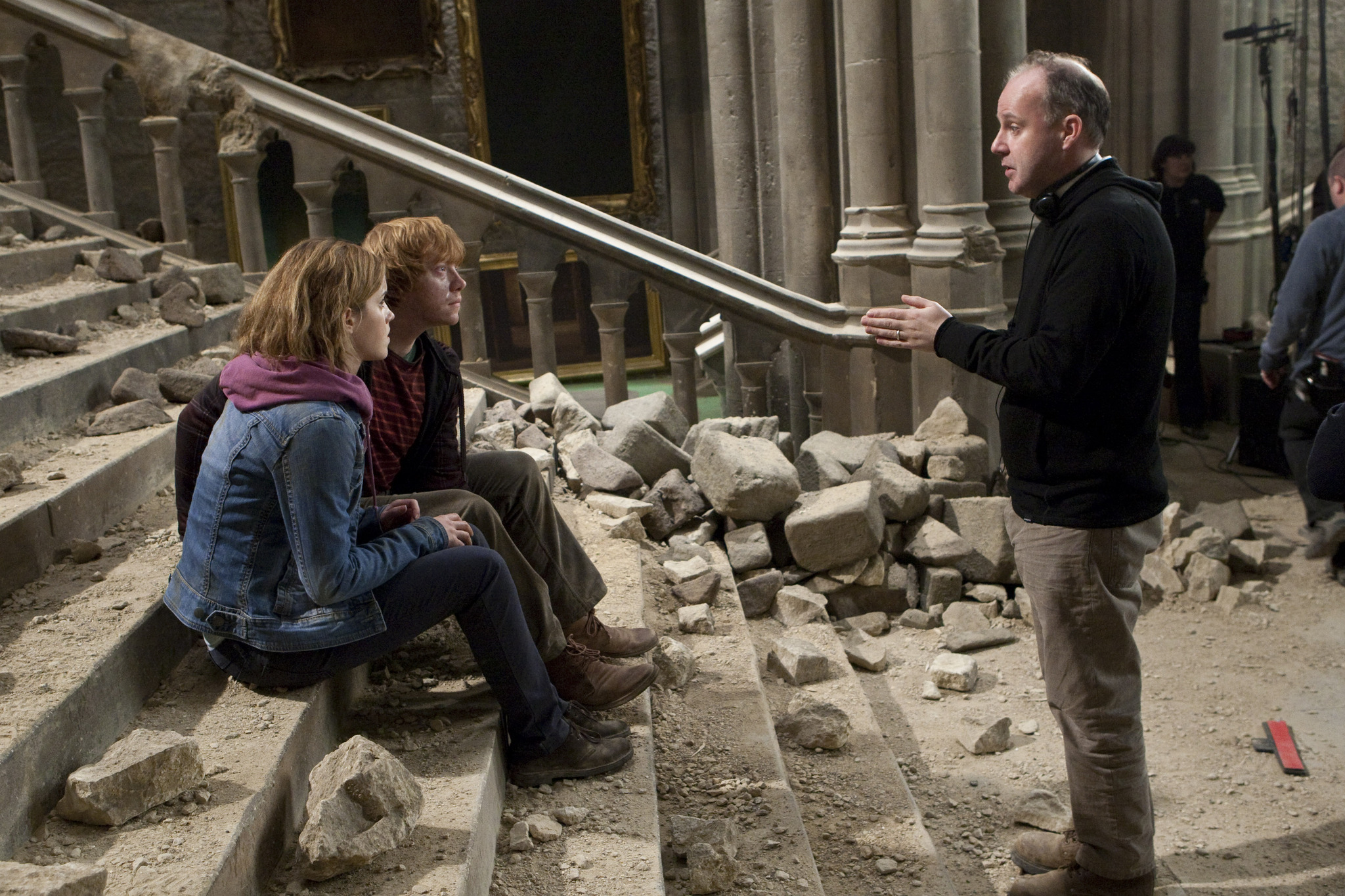 Still of Rupert Grint, Emma Watson and David Yates in Haris Poteris ir mirties relikvijos. 2 dalis (2011)