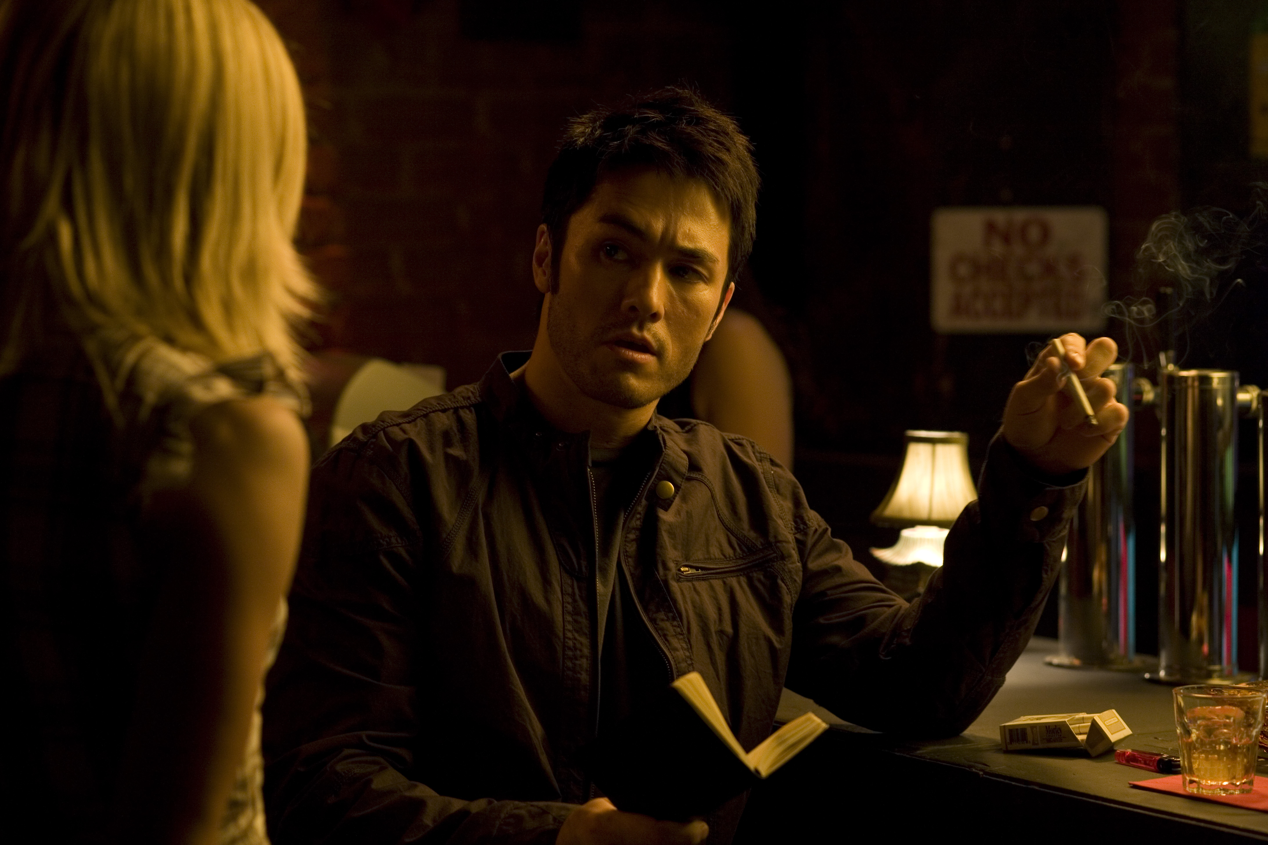 Jason Yee as 'Jake' with Dominique Swain in a scene from 'The Girl From The Naked Eye'.