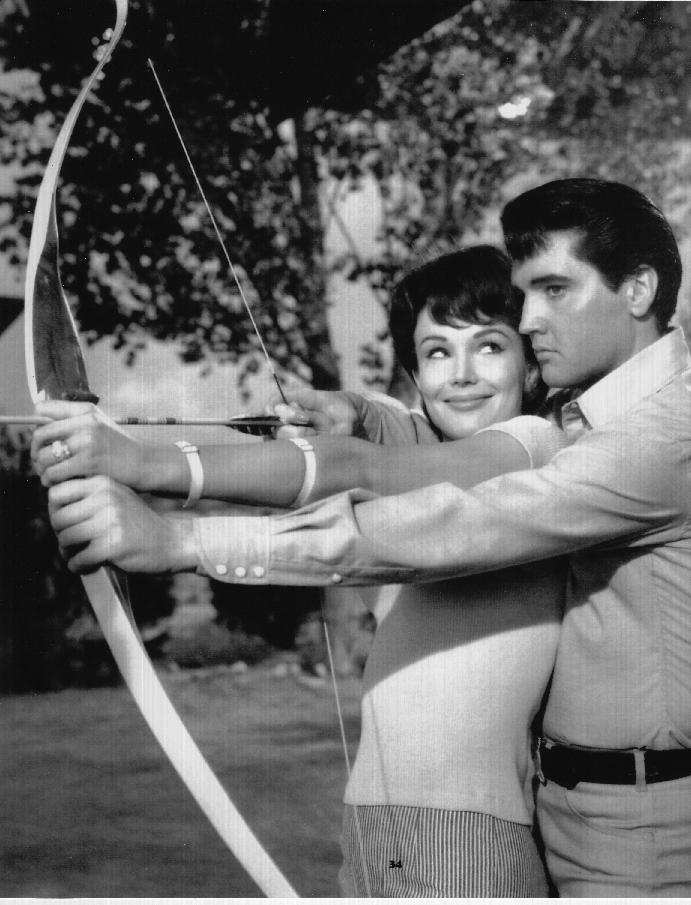 Francine York giving Elvis an archery lesson in Tickle Me 1966.
