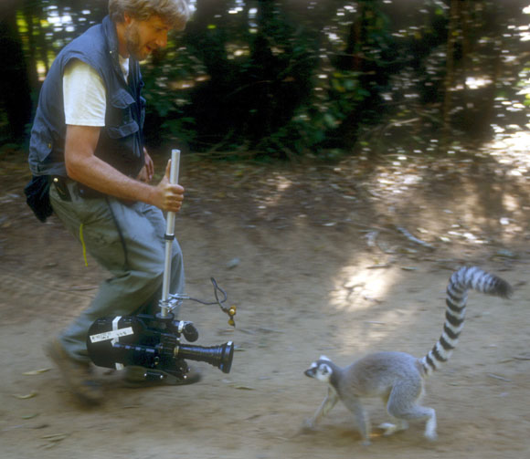 Andrew Young filming ring-tailed lemur in Madagascar.