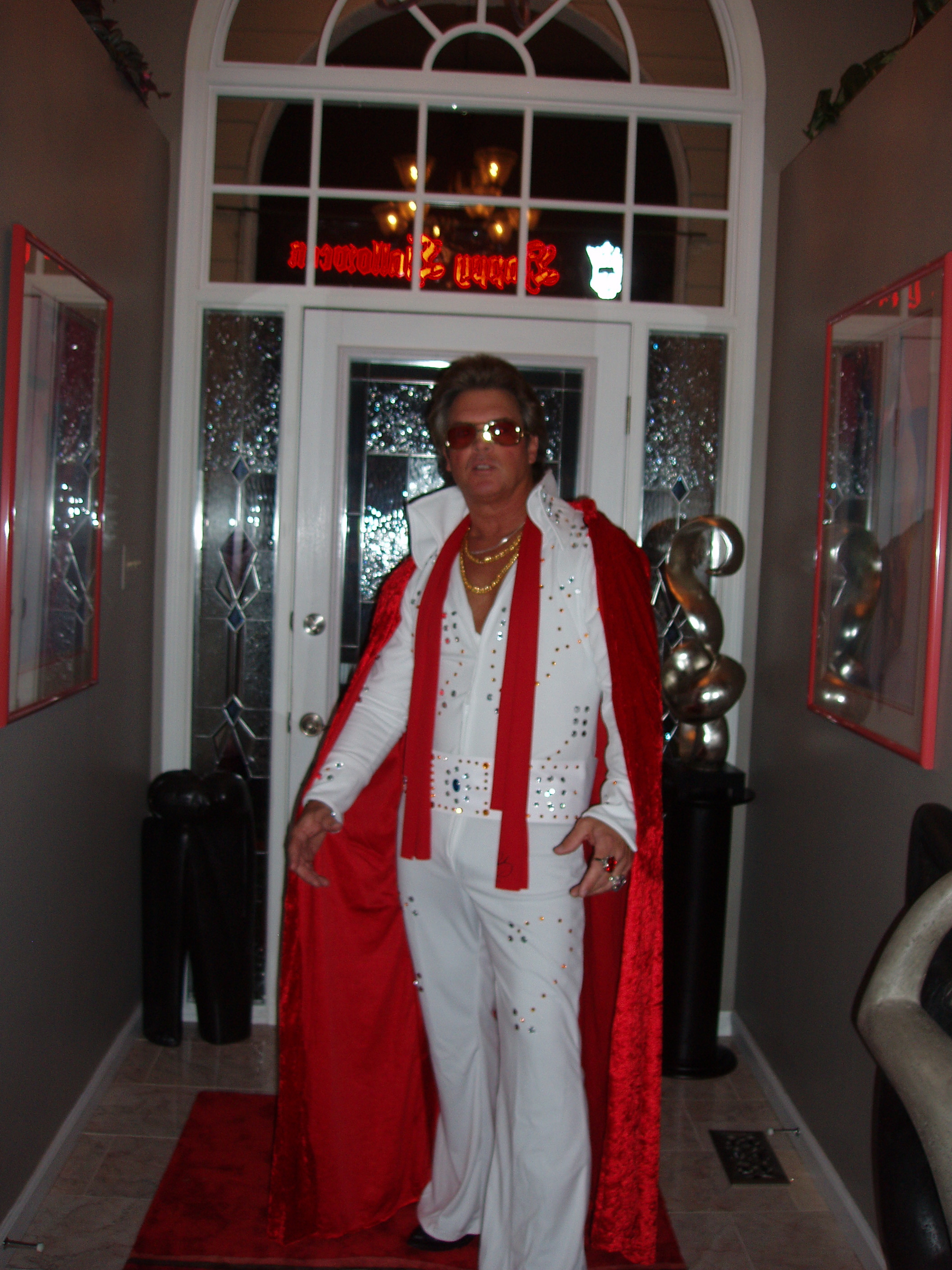 ...dressed as Elvis, role as minister for a UNLV Spring Flicks film short...'E' is everywhere in tinsel town