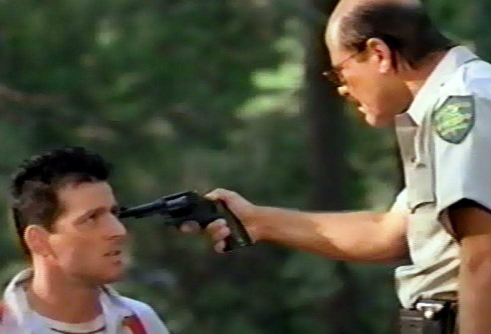 Zack Norman as Sheriff Rance Moreland (with Costas Mandylor) in 