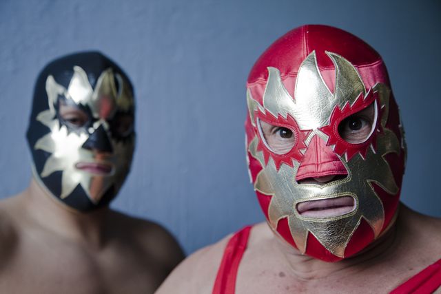 Father and son luchadores (wrestlers), Solar Jr. (left) and Solar (right) from the film, 