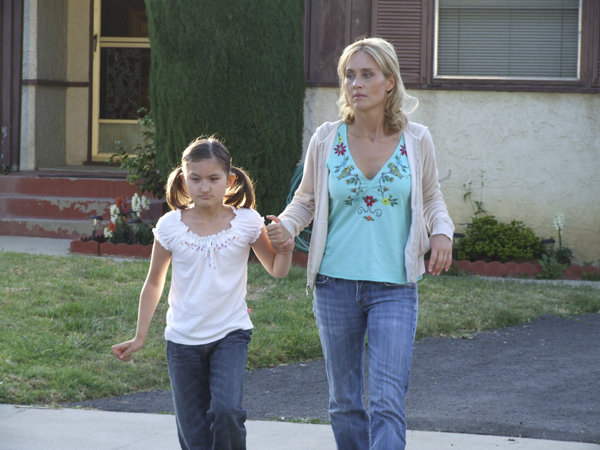 Roxborough (Samantha Rogers) with daughter Teya (Mila), Women will go to extreme lengths for those they love.