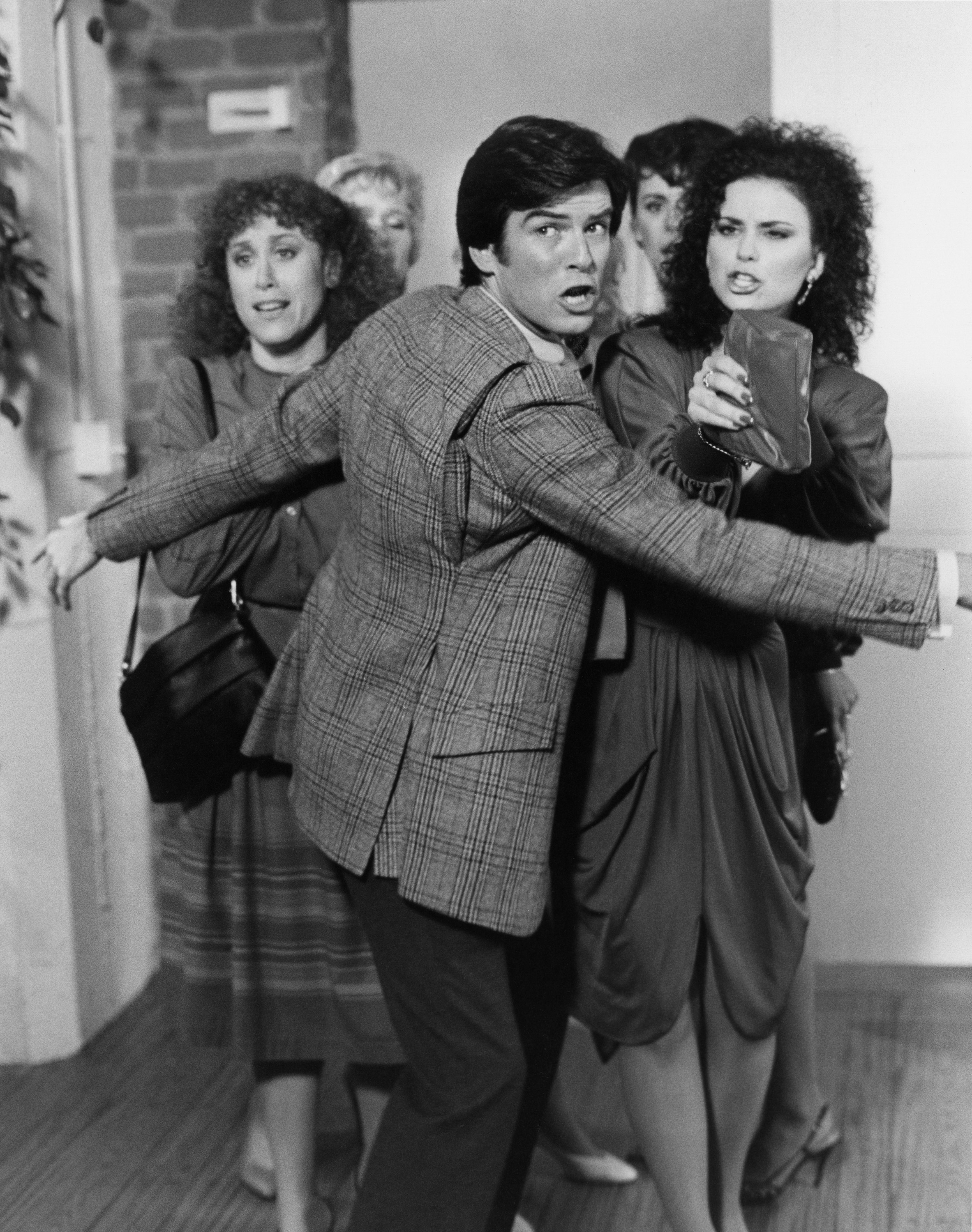 Still of Pierce Brosnan, Delta Burke and Carole White in Remington Steele (1982)