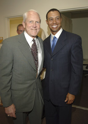 Tiger Woods and Bill Walsh