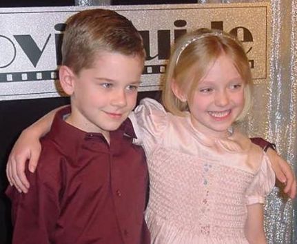 Luke Benward and Dakota Fanning presented together at the 2002 Movieguide Awards.