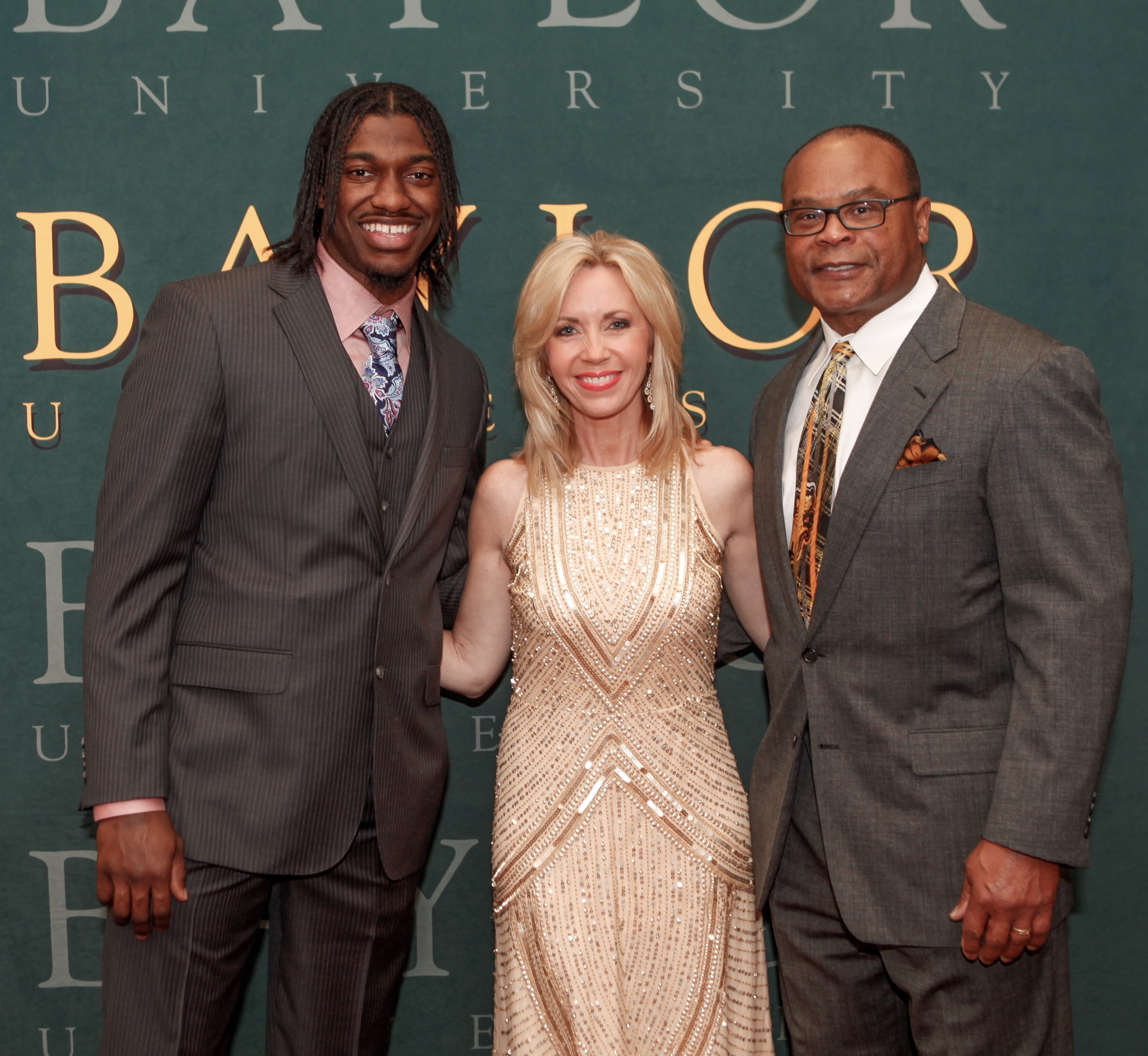 Deb Carson, Robert Griffin III and Mike Singletary at 4th Annual Going for the Gold Gala