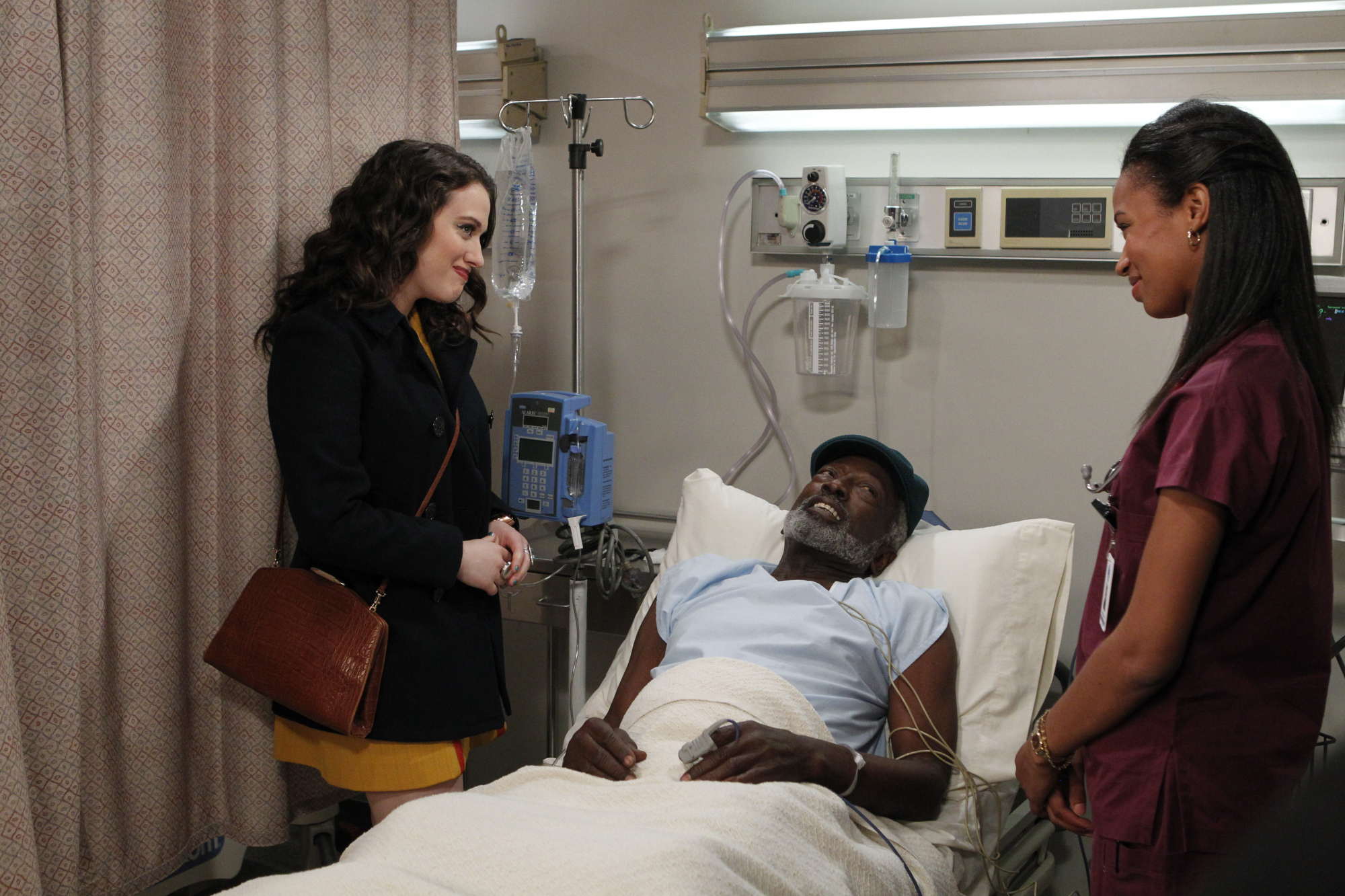 Still of Garrett Morris and Kat Dennings in 2 Broke Girls (2011)