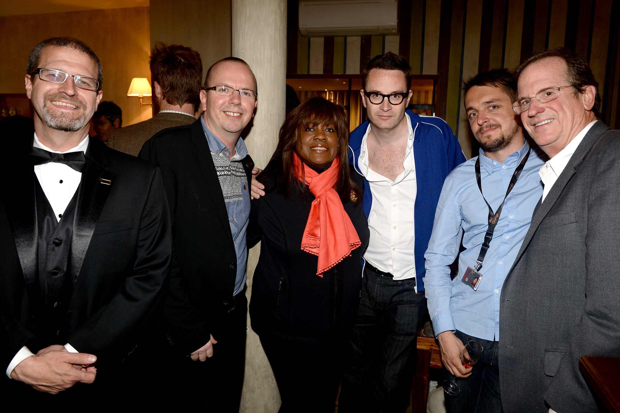 IMDb's Keith Simanton, IMDb founder Col Needham, Chaz Ebert, director Nicolas Winding Refn, Jacob Jarek and Deadline Hollywood's Peter Hammond attend the IMDB's 2013 Cannes Film Festival Dinner Party during the 66th Annual Cannes Film Festival at Restaurant Mantel on May 20, 2013 in Cannes, France.