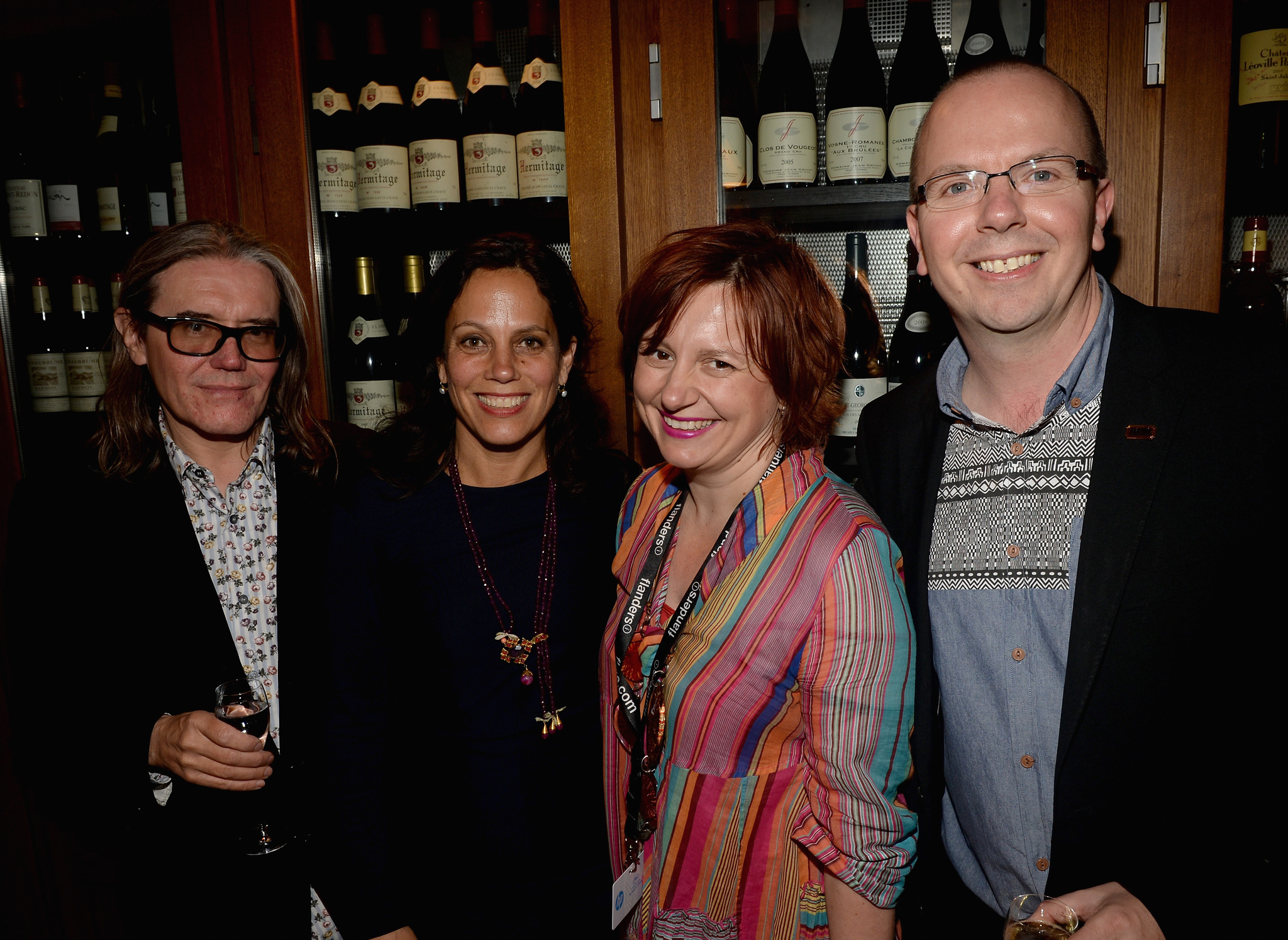 Number 9 Films' Stephen Woolley, Number 9 Films' Elizabeth Karlson, BFI's Claire Stewart and IMDb founder Col Needham attend the IMDB's 2013 Cannes Film Festival Dinner Party during the 66th Annual Cannes Film Festival at Restaurant Mantel on May 20, 2013 in Cannes, France.