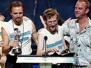 Michael Gier on stage at the MTV awards with Spike Jonze and Fatboy Slim winning a music video award.