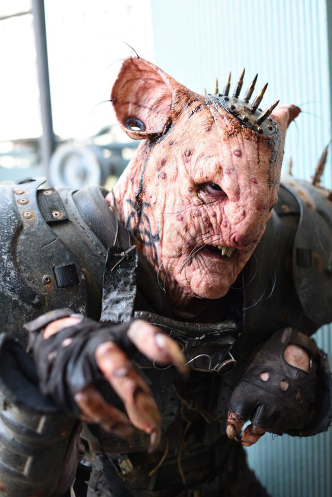 The Rat Patrol: Armageddon. Rat makeup, fingers, teeth and tail designed, sculpted, pre-painted, applied, and detailed by Richard Redlefsen. Makeup embellishments, gauges, bullet head piece, tattoos, and goggles also by Richard Redlefsen.
