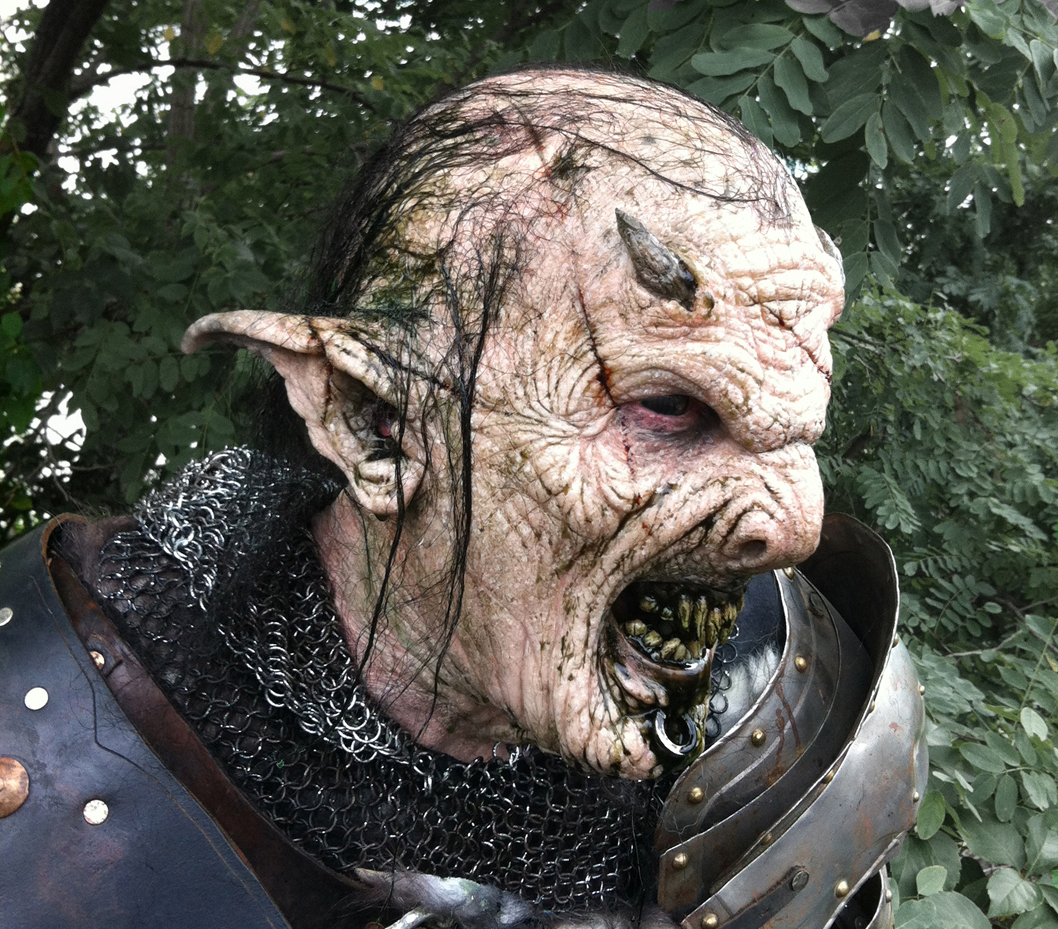 Orc makeup. Appliances and teeth sculpted, molded, applied and painted by Richard Redlefsen. Appliances produced by Vincent Van Dyke