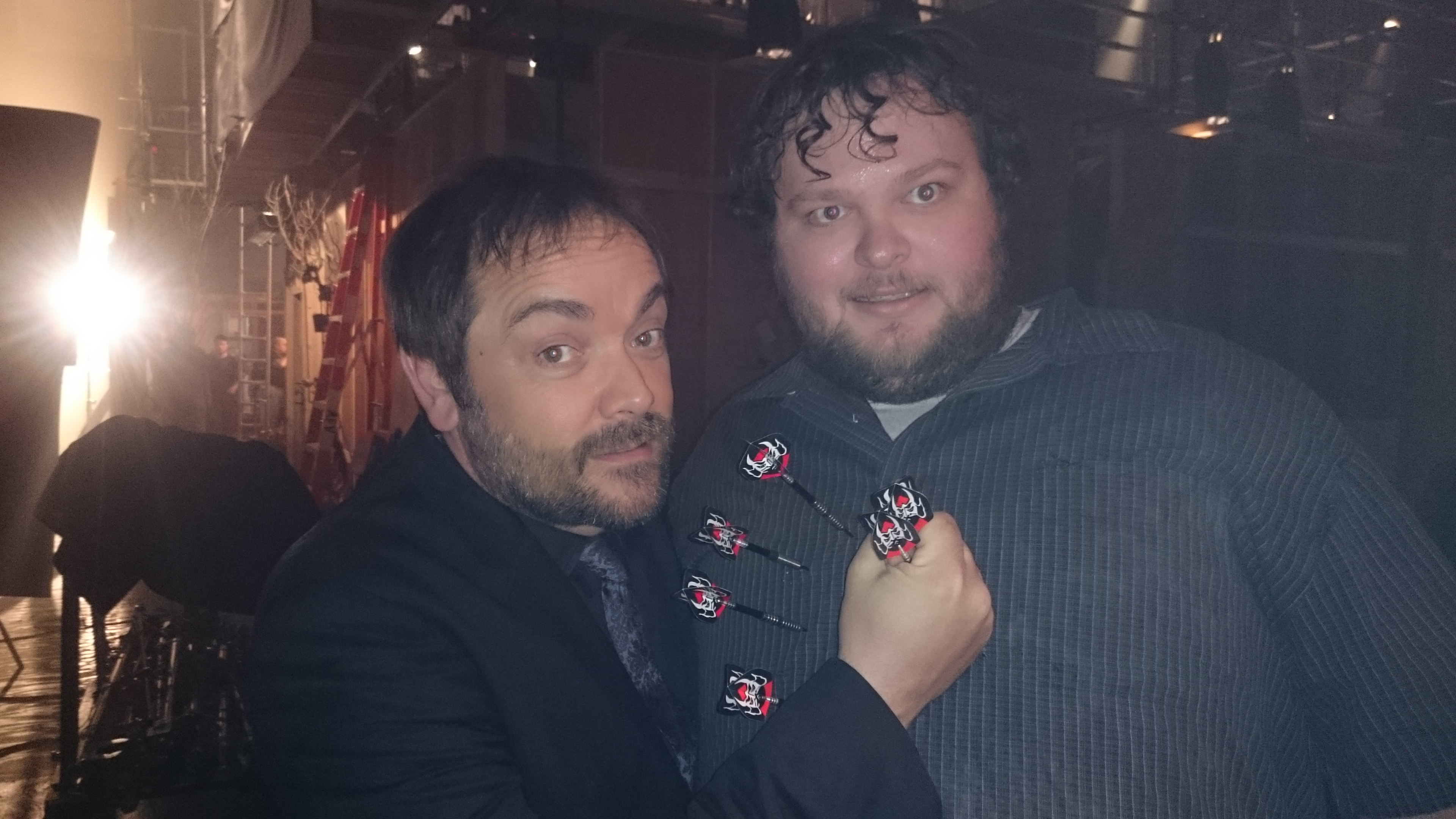 Playing a game of darts with Mark Sheppard on the set of 