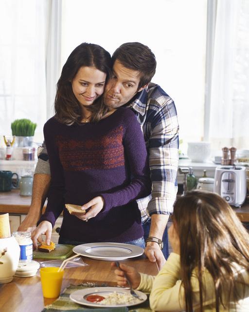 Still of Amy Acker and Geoff Stults in Happy Town (2010)