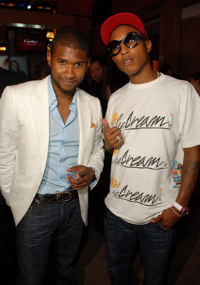 Usher Raymond and Pharrell Williams