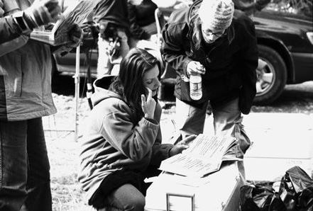 Kristina Hughes takes a review of her GREEN RIVER script as Taryn Hipwell looks on.