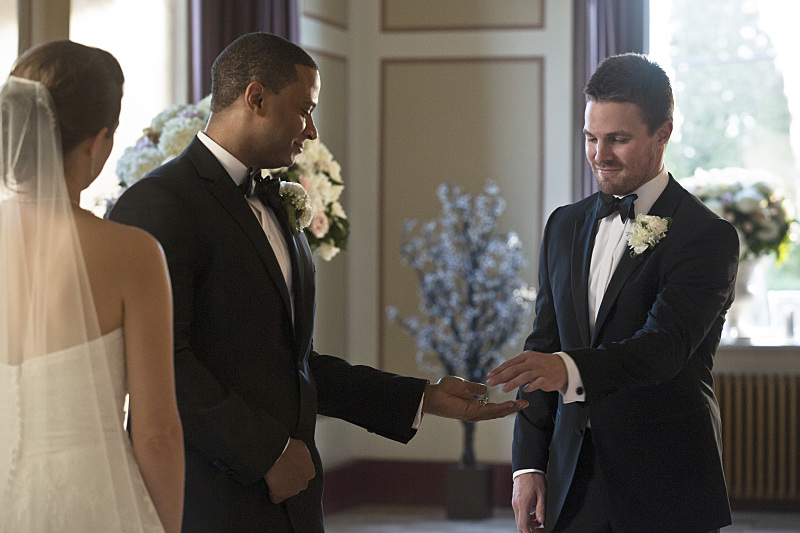 Still of David Ramsey, Audrey Marie Anderson and Stephen Amell in Strele (2012)