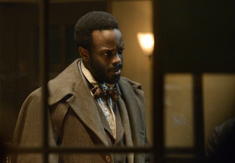 Still of Ato Essandoh and Matthew Freeman in Copper (2012)