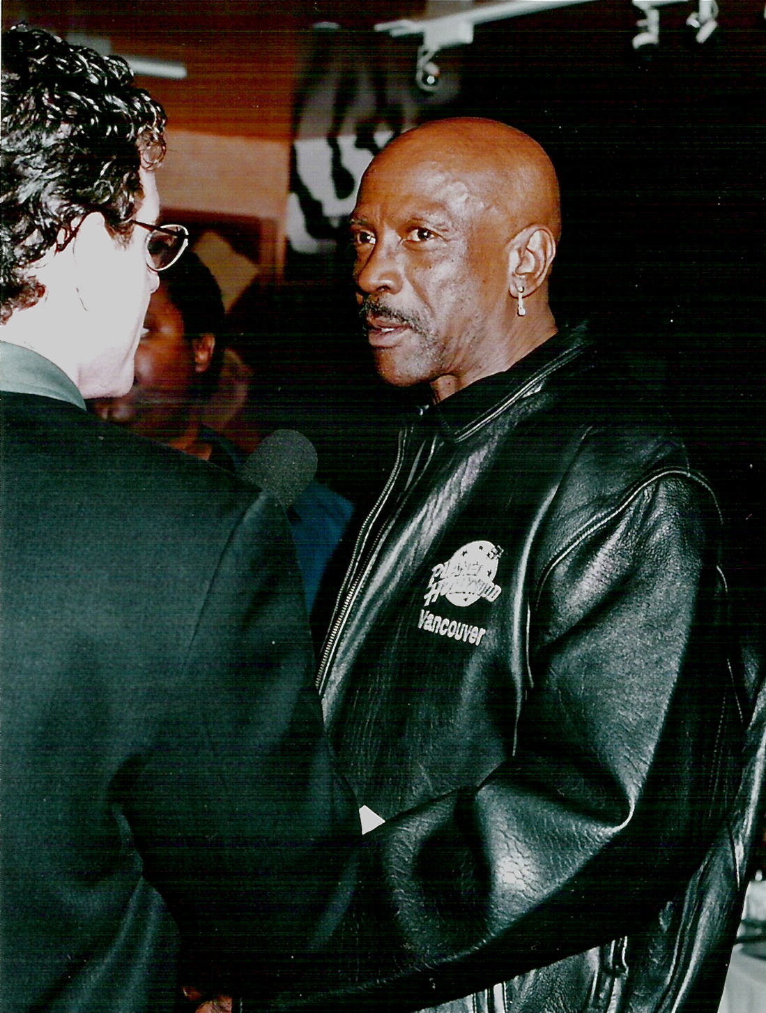 An oscar winner, Lou Gossett Jr perhaps speaking with a future statue holder (moi CK) at Planet Hollywood, Vancouver cira 1998.