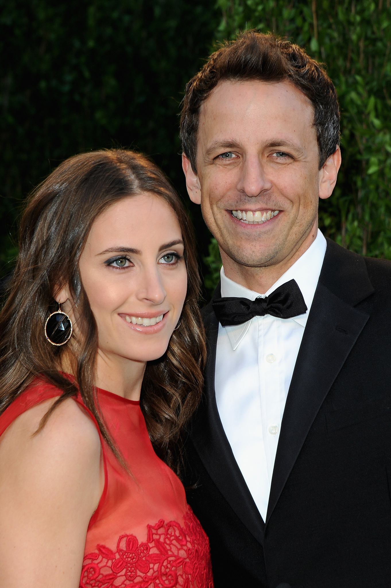 Seth Meyers (R) and Alexi Ashe arrives at the 2013 Vanity Fair Oscar Party hosted by Graydon Carter at Sunset Tower on February 24, 2013 in West Hollywood, California.