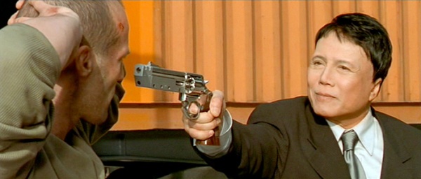 Ric Young as Mr. Kwai in 'The Transporter'