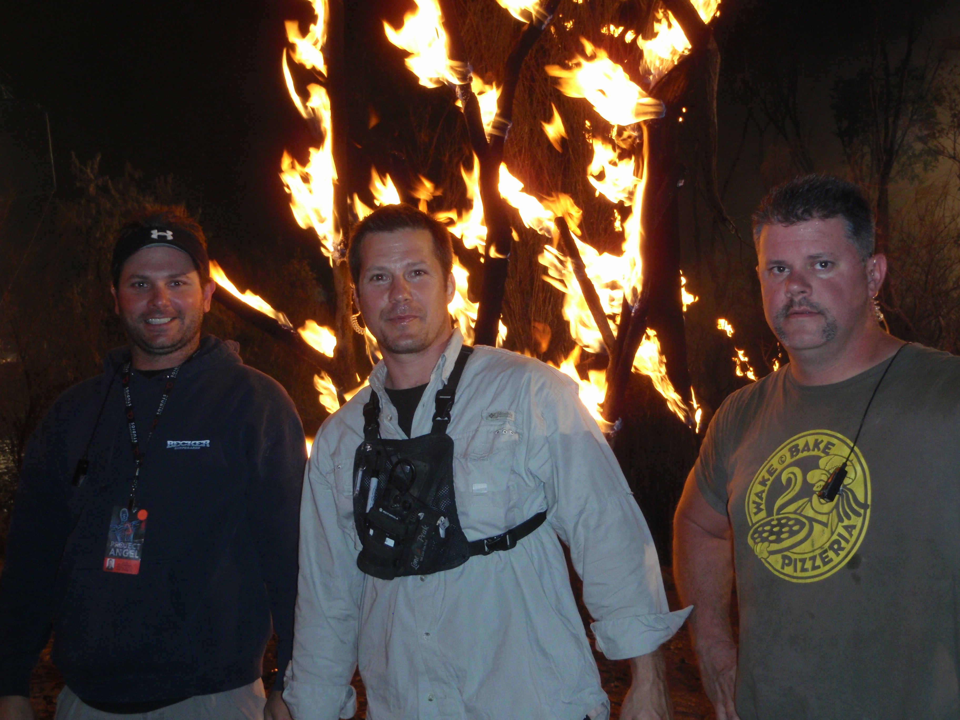 (from left to right) Chris Brenczewski, Blumes Tracy, and Mike R. Kay on set in Forest of Fire, Terminator 4