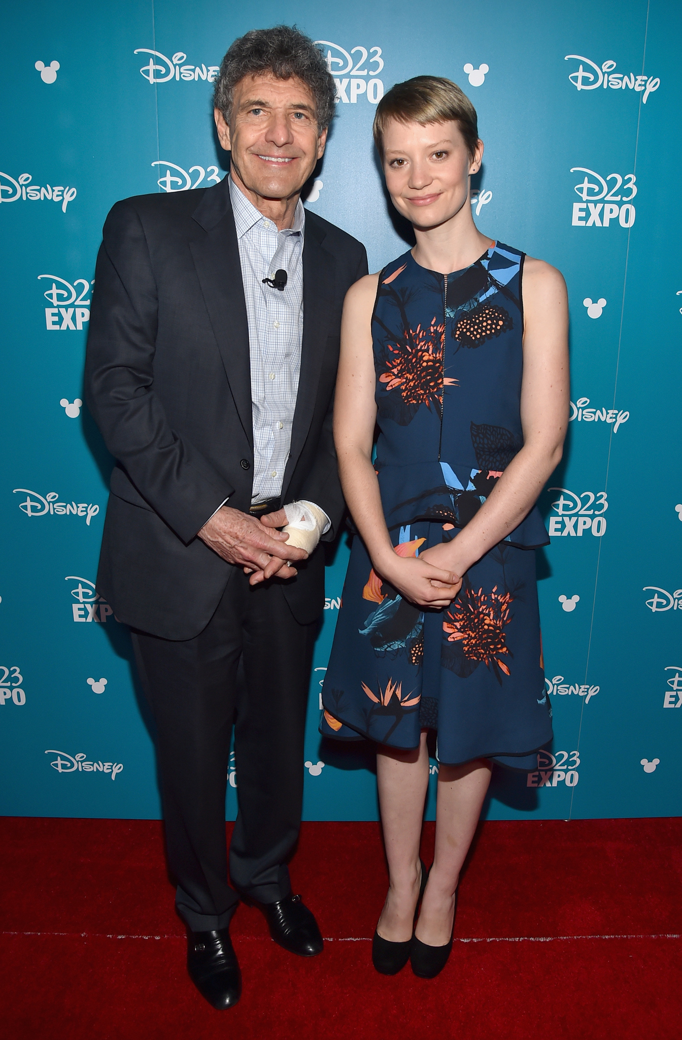 Alan Horn and Mia Wasikowska