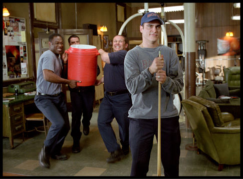 Rookie firefighter Jack Morrison (Joaquin Phoenix, right) gets a 